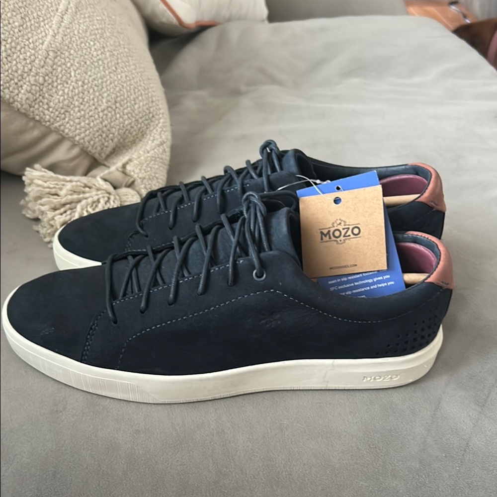 Sleek Black Sneakers with White Soles